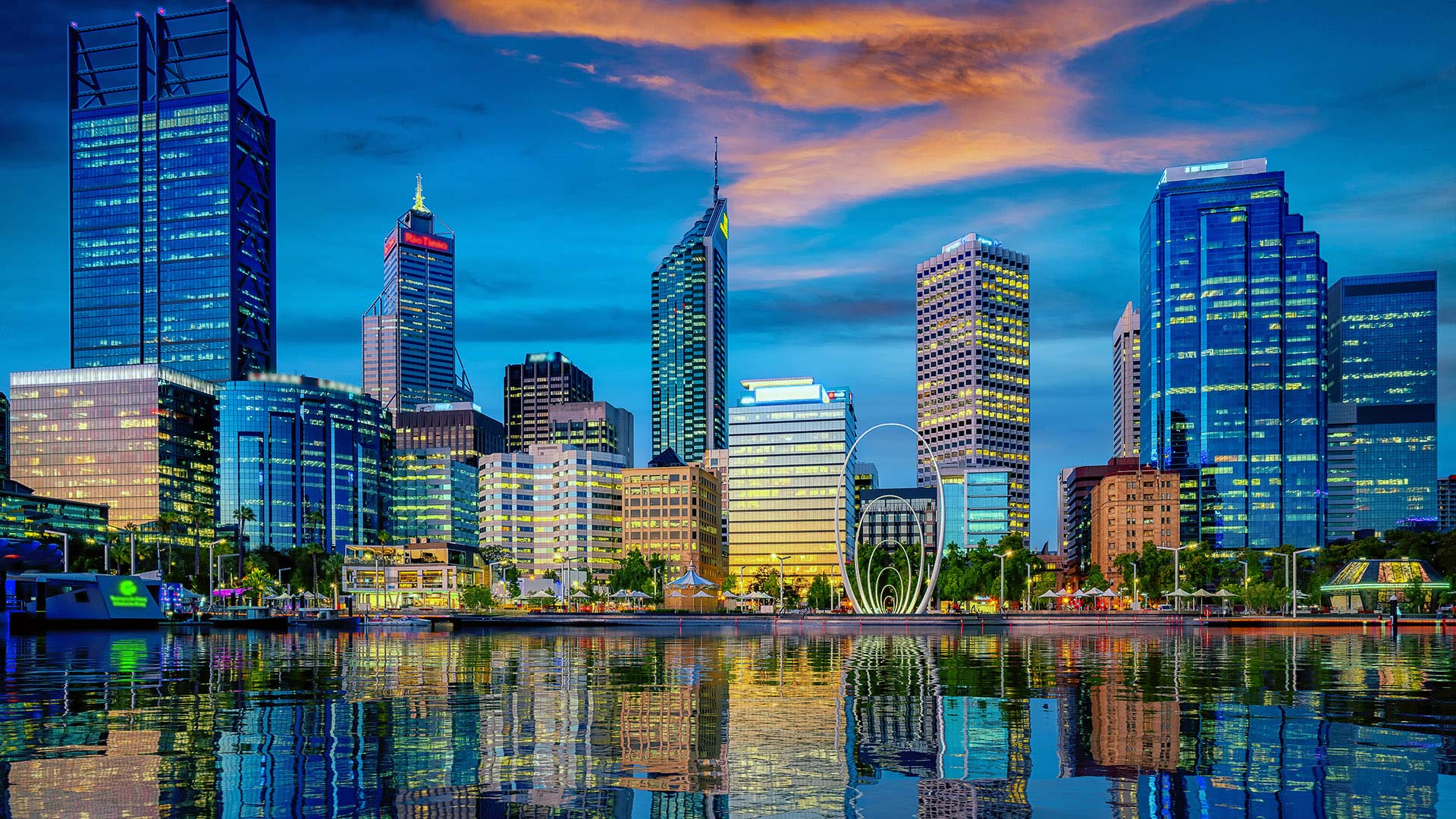 Perth skyline reflected on the Swan River at dusk.