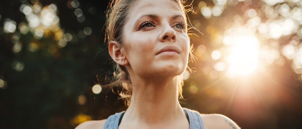 Woman looks at the sky and asks herself, "Am I ready for a relationship?"