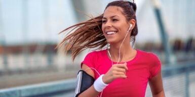 Young woman going for a nice run outside with music