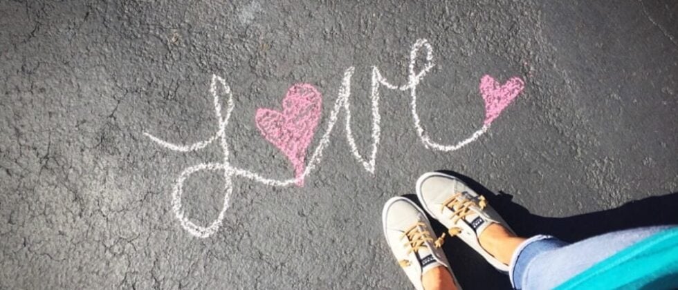does he love me symbolized by the word love written on the street