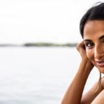 Indian single woman smiles into the camera