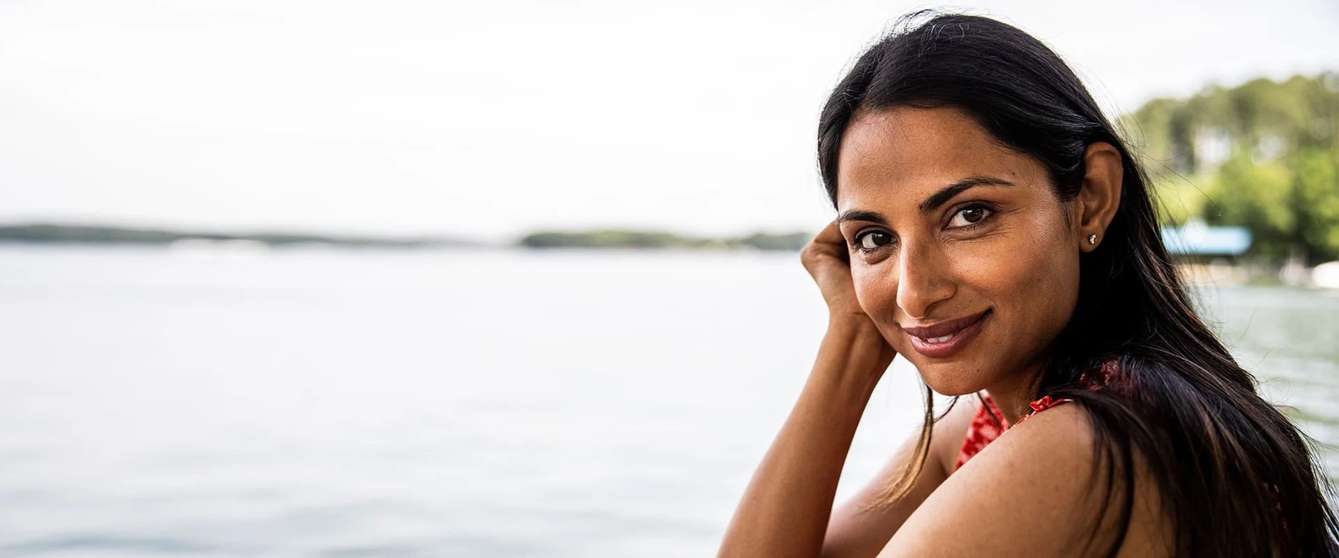 Indian single woman smiles into the camera