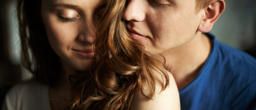 Couple smelling each other