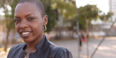 Strong smiling woman, making eye contact with the camera