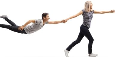 Woman pulling guy's hand and pulling him toward the future