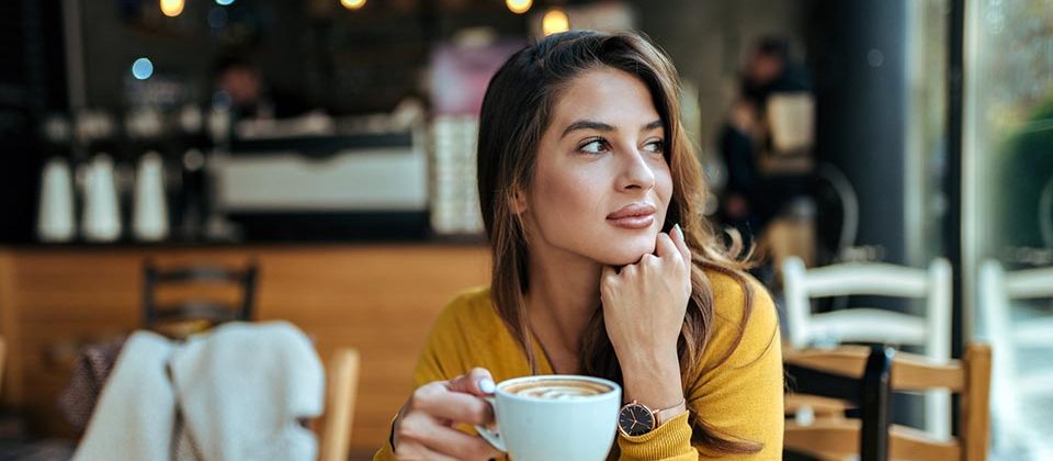 Woman looking out of window