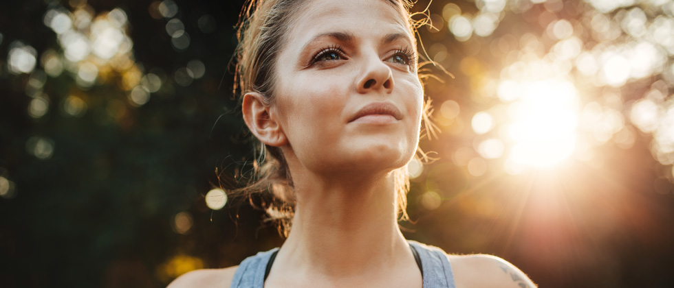 Woman looks at the sky and asks herself, "Am I ready for a relationship?"