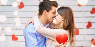 Laws of attraction - man and woman embrace intimately