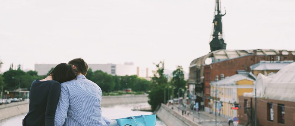 How to know you're in love symbolized by a couple sitting close to each other