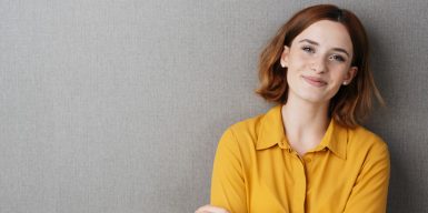 Woman hugging man from behind as a symbol of how to find the right person