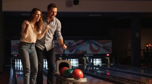 A couple playing a match of bowling.