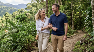 A couple walking side by side through redlynch valley in cairns. (Generated with AI)