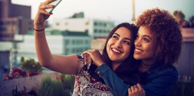 Two woman making a photo together