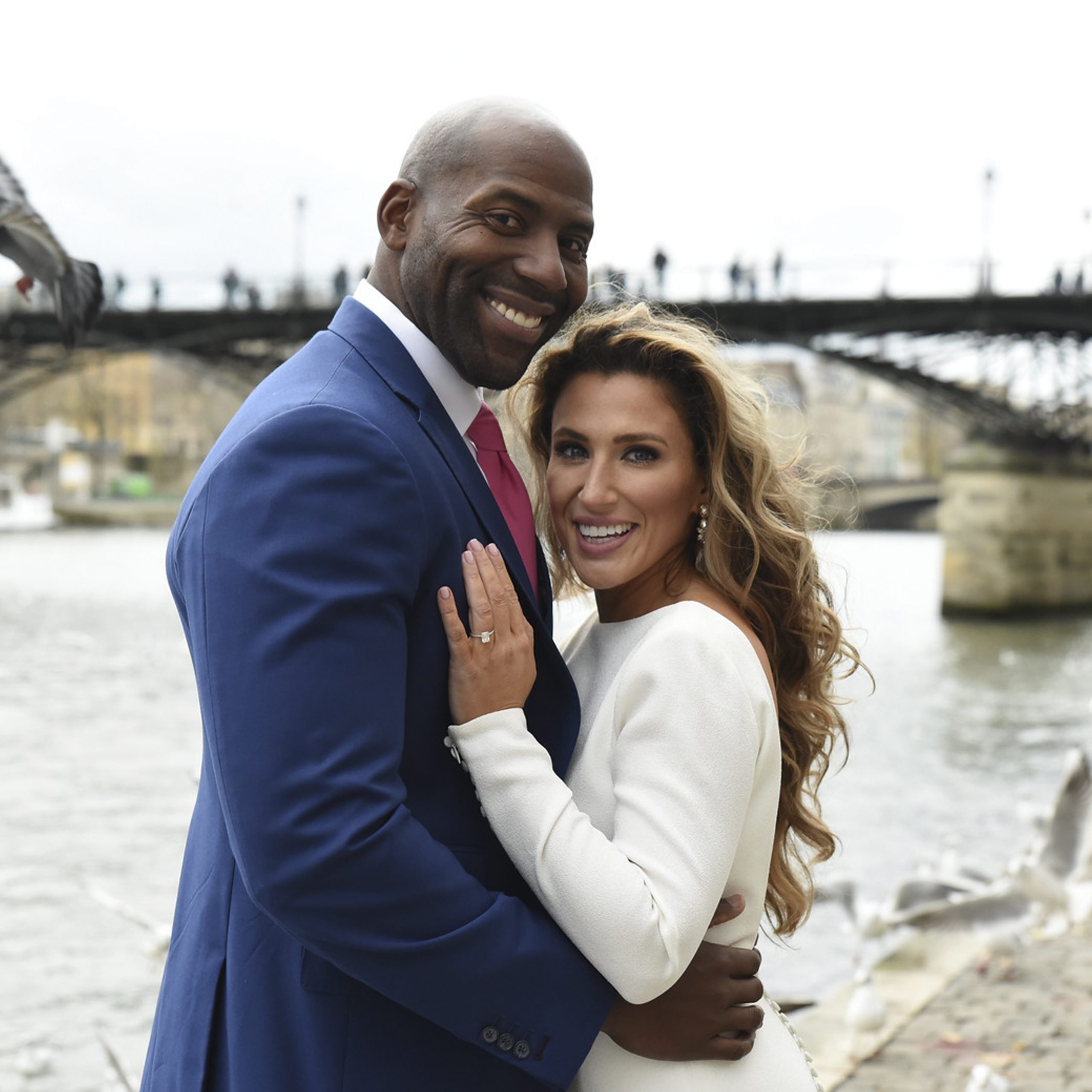Brittany & Willie smiling at the camera as eharmony success story,