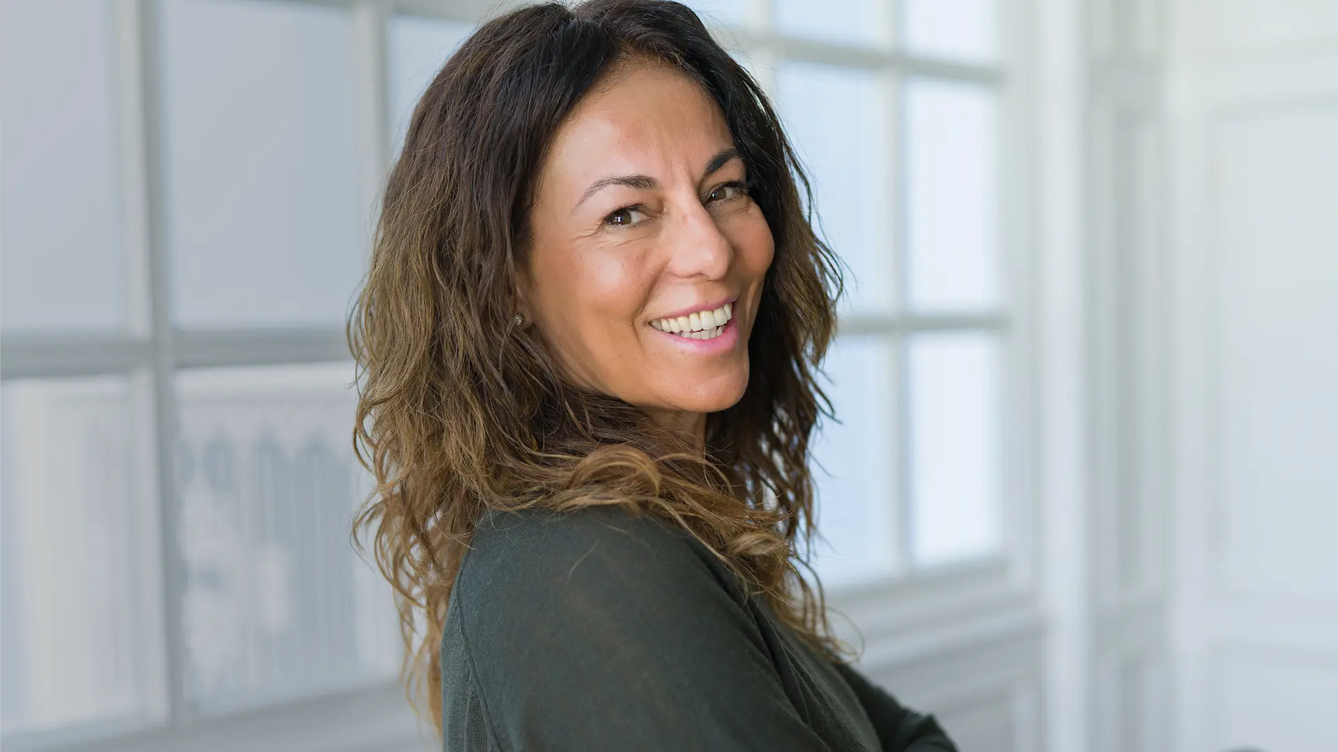 Side-portrait of a single women over 50